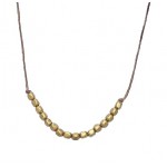 Brass Bead Necklace on Irish Linen