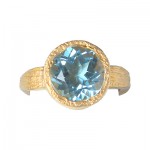 Blue Topaz Ring on Wood Textured Band Blue Topaz Ring on Wood Textured Band
